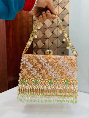 Hetal clutch rose gold